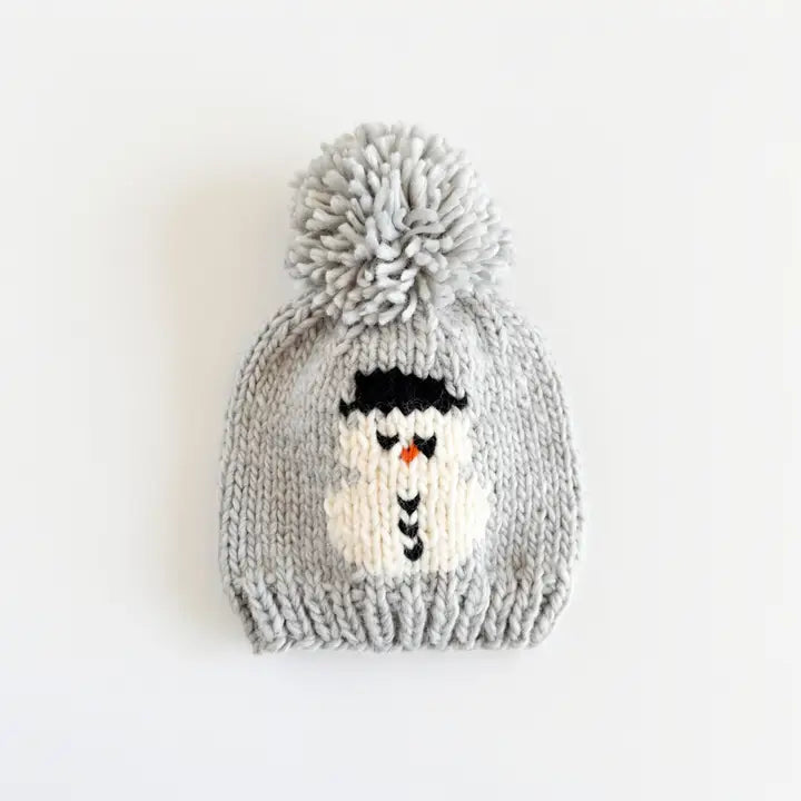 Snowmen Hat with a fluffy pom-pom.